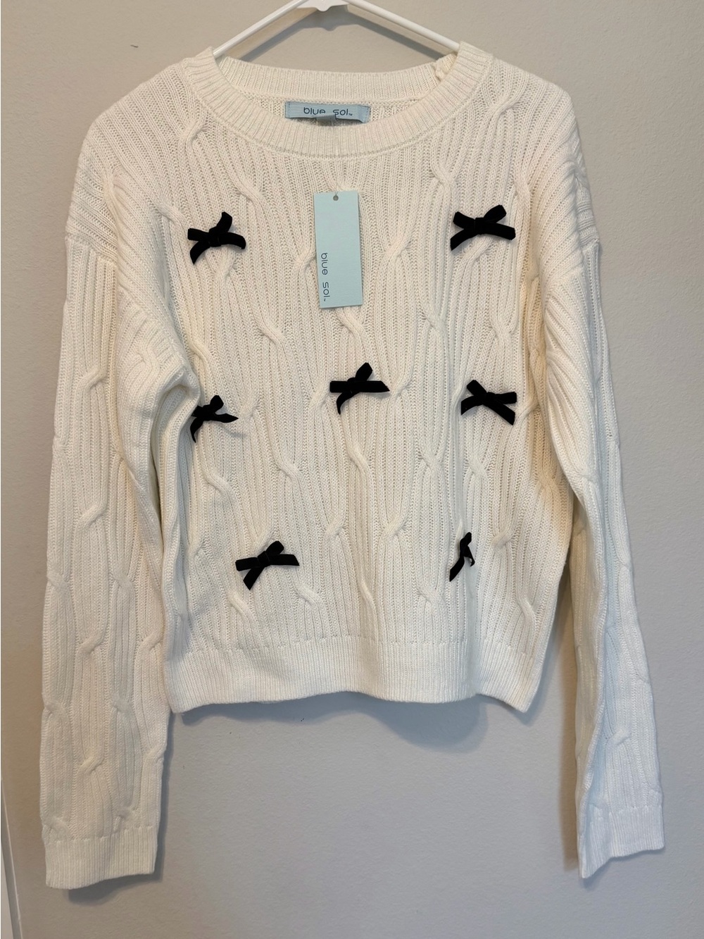 Preppy Coquette Cream Cable-Knit Sweater with Black Bow Accents